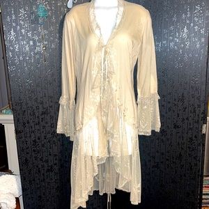 A beautiful renaissance type blouse with beautiful embroidery and long torso